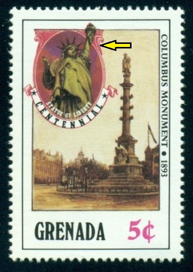 GRENADA.  zrcadlově zobrazená socha svobody