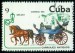 KUBA. koně s kočárem jsou v pohybu, ale chybí vozka (1)
