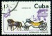 KUBA. koně s kočárem jsou v pohybu, ale chybí vozka (2)