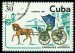 KUBA. kůň s kočárem je v pohybu, ale chybí vozka